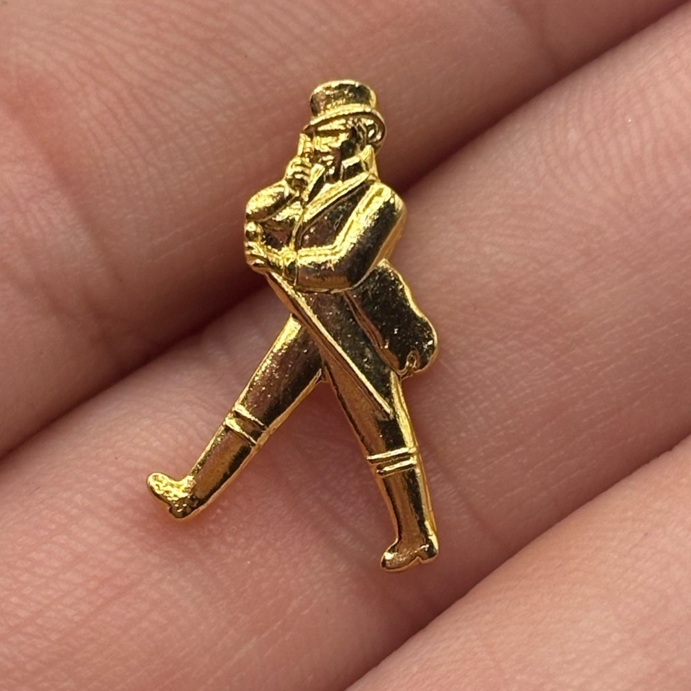 Gold-tone Johnnie Walker Striding Man pin